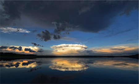 saskatchewan nature - Clouds reflected in the calm waters of Kenosee lake. Stock Photo - Premium Royalty-Free, Code: 6118-08001501