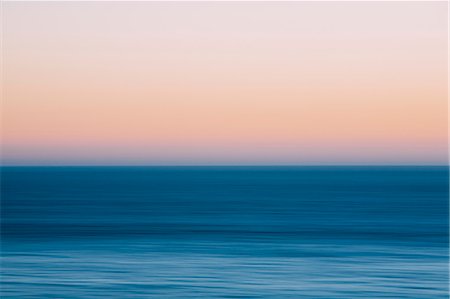 simsearch:6118-07203205,k - A view out to sea over the Pacific Ocean at dusk. Blurred motion. Stock Photo - Premium Royalty-Free, Code: 6118-08001511