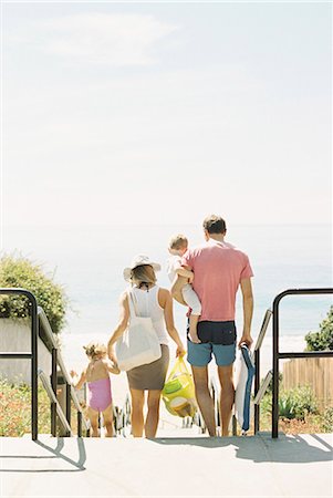 descend - Family on a day out at a sandy beach by the ocean. Stock Photo - Premium Royalty-Free, Code: 6118-08202488