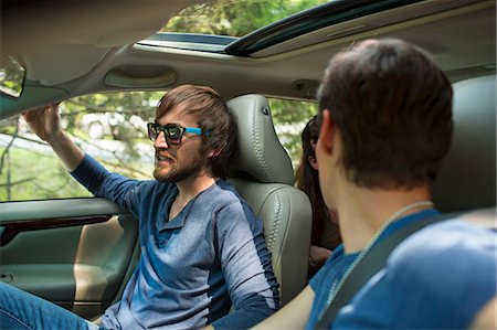 Two people in a car, passenger and driver. Stock Photo - Premium Royalty-Free, Code: 6118-08226930