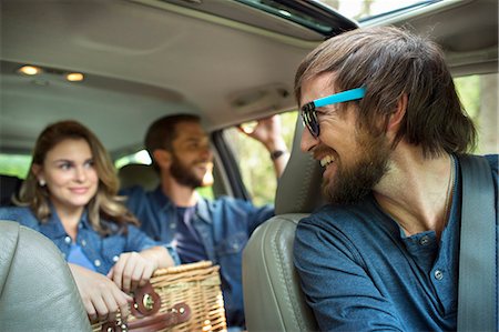 sport utility vehicle - A group of people inside a car, on a road trip. Stock Photo - Premium Royalty-Free, Code: 6118-08226932