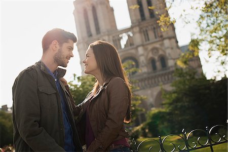 romantic date places - Two people, a couple standing close together in a historic city Stock Photo - Premium Royalty-Free, Code: 6118-08394163