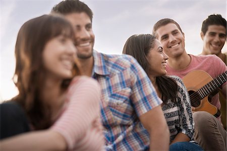 A group of people, men and women gathered together. Stock Photo - Premium Royalty-Free, Code: 6118-08394108