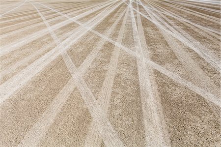 flat (surface) - Tire tracks on the dry surface of the Black Rock Desert. Stock Photo - Premium Royalty-Free, Code: 6118-08313768