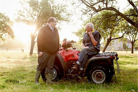 rural business owner - Two men, a farmer and a man with a clipboard, by a quadbike in an orchard. Stock Photo - Premium Royalty-Free, Code: 6118-08313848