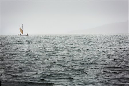 Traditional sustainable oyster fishing. Traditional sailing boats on the river Fal estuary. Stock Photo - Premium Royalty-Free, Code: 6118-08842095