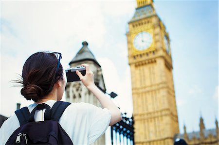 simsearch:614-06898526,k - Young Japanese woman enjoying a day out in London, taking a picture of Big Ben. Stock Photo - Premium Royalty-Free, Code: 6118-08827430