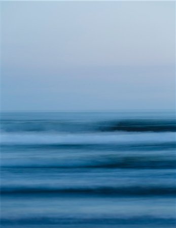 Ocean waves and the view to the horizon over the sea at dusk from the beach. Stock Photo - Premium Royalty-Free, Code: 6118-08827553