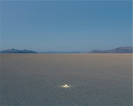 simsearch:6118-08860557,k - Small glowing light on vast playa, Black Rock Desert, Nevada Stock Photo - Premium Royalty-Free, Code: 6118-08827575