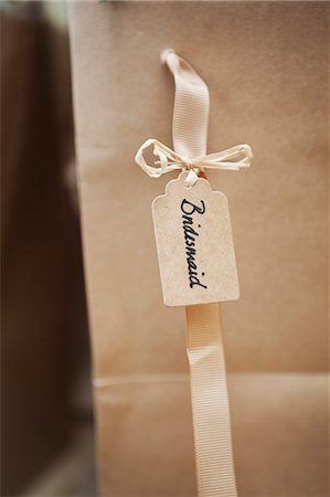 simsearch:6118-08947769,k - Close up of handwritten name tag on a wedding banquet chair for the bridesmaid at a wedding. Stock Photo - Premium Royalty-Free, Code: 6118-08947759