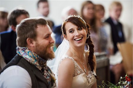 simsearch:6118-08947762,k - Smiling bride and groom at their church wedding. Stockbilder - Premium RF Lizenzfrei, Bildnummer: 6118-08947778