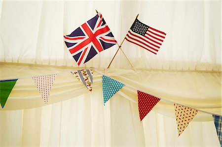 simsearch:6118-08947762,k - Decoration of bunting and English and US flag in a wedding marquee. Stockbilder - Premium RF Lizenzfrei, Bildnummer: 6118-08947781