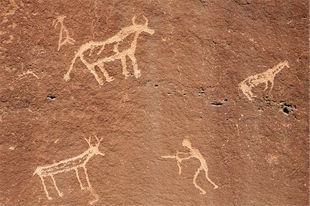 rock art on cliffs - Detail of prehistoric Native American petroglyphs, near Bluff, Utah Stock Photo - Premium Royalty-Free, Code: 6118-08947905