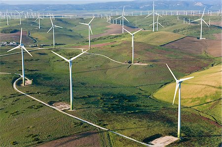 High angle view of rolling landscape with fields and wind turbines. Stock Photo - Premium Royalty-Free, Code: 6118-09076405
