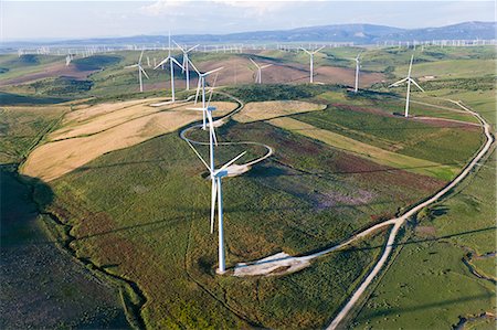 High angle view of rolling landscape with fields and wind turbines. Stock Photo - Premium Royalty-Free, Code: 6118-09076406