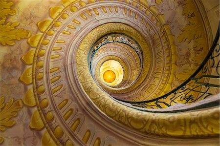 painting color on stairs and banisters - Low angle view of spiral staircase decorated with murals of golden Acanthus flowers and ornamental borders. Stock Photo - Premium Royalty-Free, Code: 6118-09076412