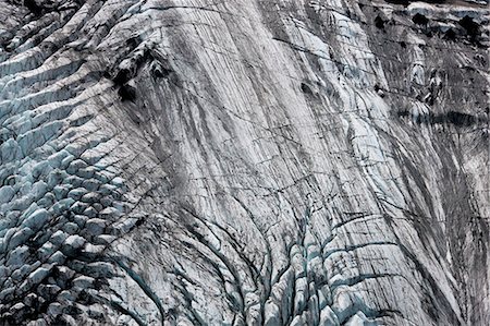 Aerial view of landscape with glacier and volcanic ash. Photographie de stock - Premium Libres de Droits, Code: 6118-09076529