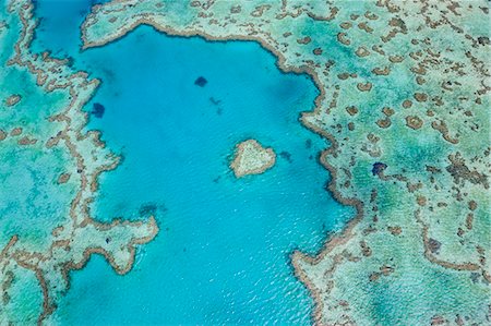Aerial view of turquoise reef in the Pacific Ocean. Stock Photo - Premium Royalty-Free, Code: 6118-09076665