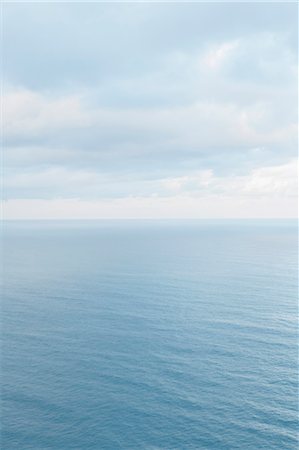 simsearch:6118-09112086,k - View from the land over the ocean, to the horizon. Open space, seascape and skyscape. Stock Photo - Premium Royalty-Free, Code: 6118-09018272