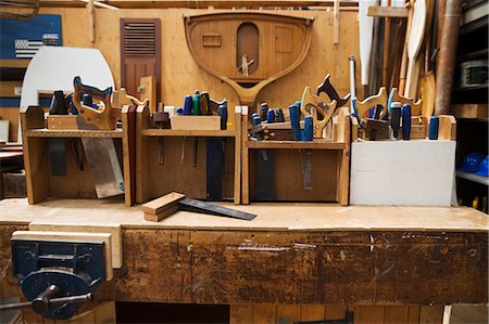 simsearch:6118-09018535,k - Work bench in a boat-builder's workshop, selection of hand tools for wood working. Stock Photo - Premium Royalty-Free, Code: 6118-09018525