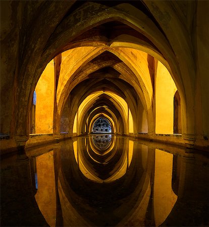 simsearch:400-07209028,k - Interior view of  the Rainwater bath in the Alcazar de Seville, Andalusia, Spain. Stock Photo - Premium Royalty-Free, Code: 6118-09028095