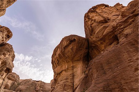 simsearch:6119-08266639,k - Low angle view of rock formation at Petra, Jordan. Stock Photo - Premium Royalty-Free, Code: 6118-09028123