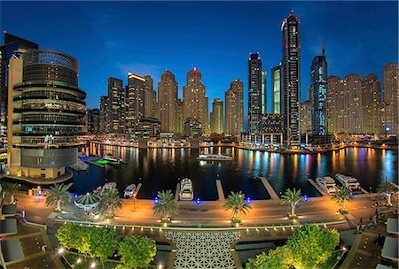 simsearch:841-03034485,k - Cityscape of Dubai, United Arab Emirates at dusk, with skyscrapers and the marina in the foreground. Stock Photo - Premium Royalty-Free, Code: 6118-09028202