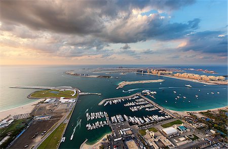 simsearch:649-08632842,k - Aerial view of the cityscape of Dubai, United Arab Emirates, with skyscrapers and the marina in the foreground. Stock Photo - Premium Royalty-Free, Code: 6118-09028234