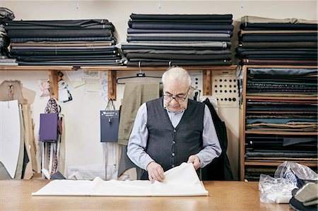 simsearch:649-07905311,k - Man inspecting fabric in family-run tailor business Stock Photo - Premium Royalty-Free, Code: 6118-09148328