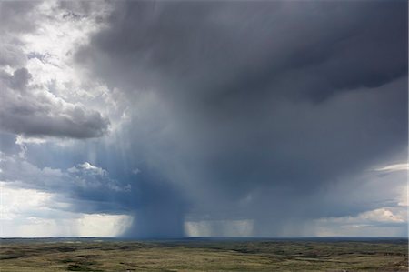 electrical storm - Dark storm clouds of over Grasslands National Park, Saskatchewan, Canada. Stock Photo - Premium Royalty-Free, Code: 6118-09173783