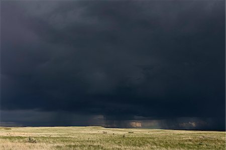 storm canada - Dark storm clouds of over Grasslands National Park, Saskatchewan, Canada. Stock Photo - Premium Royalty-Free, Code: 6118-09173787