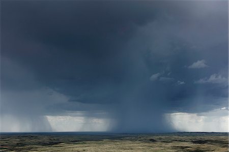 storm canada - Dark storm clouds of over Grasslands National Park, Saskatchewan, Canada. Stock Photo - Premium Royalty-Free, Code: 6118-09173786