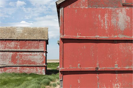 Old farm outbuildings on prairie, Stock Photo - Premium Royalty-Free, Code: 6118-09173843
