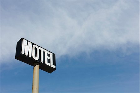 road sign, canada - Motel sign against blue sky, near Maple Creek, Saskatchewan, Canada. Stock Photo - Premium Royalty-Free, Code: 6118-09173855