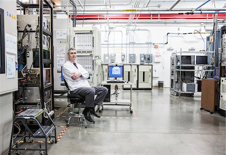 electricity equipment - A portrait of a Caucasian male technician in a technical research and development site. Stock Photo - Premium Royalty-Free, Code: 6118-09174124