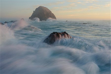 Seascape with breaking waves over rocks at dusk. Stock Photo - Premium Royalty-Free, Code: 6118-09112063