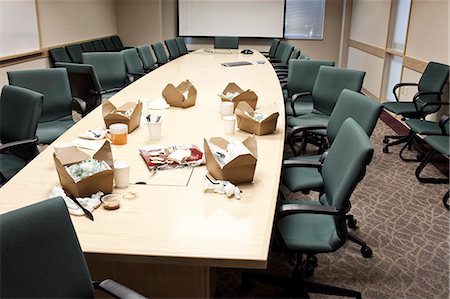 Conference room table with take out lunches Stock Photo - Premium Royalty-Free, Code: 6118-09129501