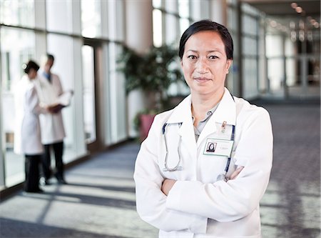 simsearch:6118-09129710,k - Asian woman doctor in lab coat with stethoscope. Stockbilder - Premium RF Lizenzfrei, Bildnummer: 6118-09129666