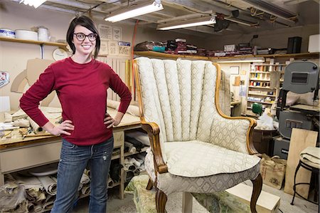 simsearch:845-06008176,k - Portrait of a young Caucasian woman upholsterer and a chair she is working on. Stock Photo - Premium Royalty-Free, Code: 6118-09130083