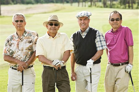 simsearch:832-03640492,k - Team of senior golfers out to play a round of golf. Fotografie stock - Premium Royalty-Free, Codice: 6118-09139699