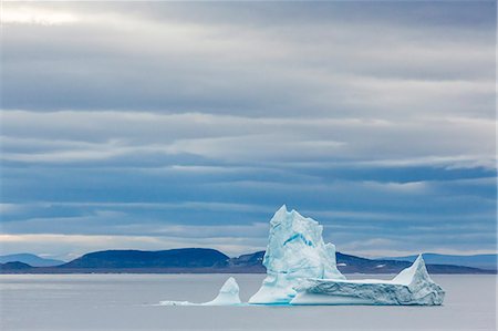 Pinnacled iceberg in Isabella Bay, Baffin Island, Nunavut, Canada, North America Stock Photo - Premium Royalty-Free, Code: 6119-07443683