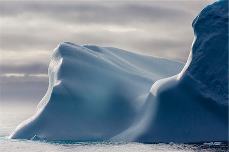 Huge iceberg in Baffin Bay, Nunavut, Canada, North America Fotografie stock - Premium Royalty-Free, Codice: 6119-07443686