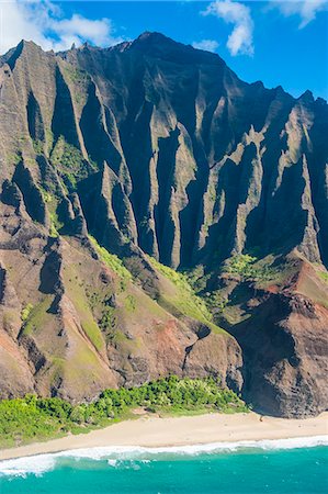 simsearch:6119-07443857,k - Aerial of the rugged Napali coast, Kauai, Hawaii, United States of America, Pacific Stock Photo - Premium Royalty-Free, Code: 6119-07443798