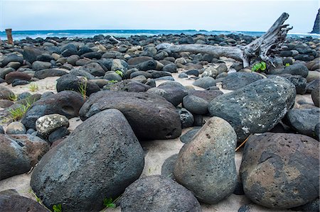 Huge pebbles on Halawa Beach in Halawa Bay on the island of Molokai, Hawaii, United States of America, Pacific Stock Photo - Premium Royalty-Free, Code: 6119-07443879