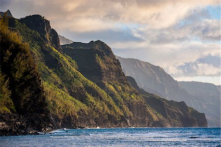 simsearch:6119-07443832,k - Sunset on the Napali coast, Kauai, Hawaii, United States of America, Pacific Foto de stock - Sin royalties Premium, Código: 6119-07443819