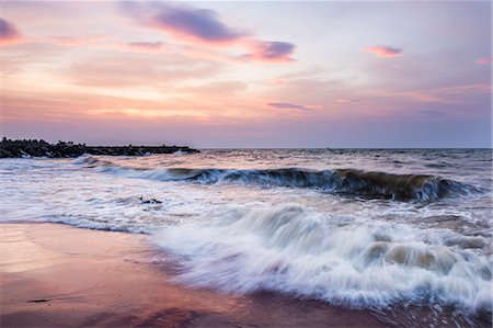 sri lanka nature photography - Waves crashing on Negombo Beach at sunset, West Coast of Sri Lanka, Asia Stock Photo - Premium Royalty-Free, Code: 6119-07451174