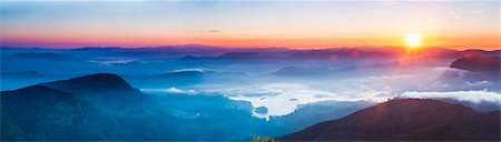 scenic - Adams Peak (Sri Pada) view at sunrise, mountains and the Maussakele Reservoir, Central Highlands, Sri Lanka, Asia Stock Photo - Premium Royalty-Free, Code: 6119-07451190
