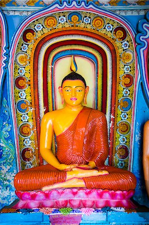 Colourful Buddha statue at Isurumuniya Vihara, Anuradhapura, UNESCO World Heritage Site, Sri Lanka,Asia Stockbilder - Premium RF Lizenzfrei, Bildnummer: 6119-07451195