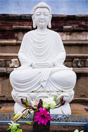 sitting buddha statue - Isurumuniya Vihara, a Buddhist cave temple in the Cultural Triangle, Anuradhapura, Sri Lanka, Asia Stock Photo - Premium Royalty-Free, Code: 6119-07451199