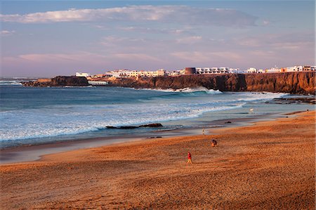 fuerteventura - The beach Playa del Castillo at sunset, El Cotillo, Fuerteventura, Canary Islands, Spain, Atlantic, Europe Photographie de stock - Premium Libres de Droits, Code: 6119-07451800